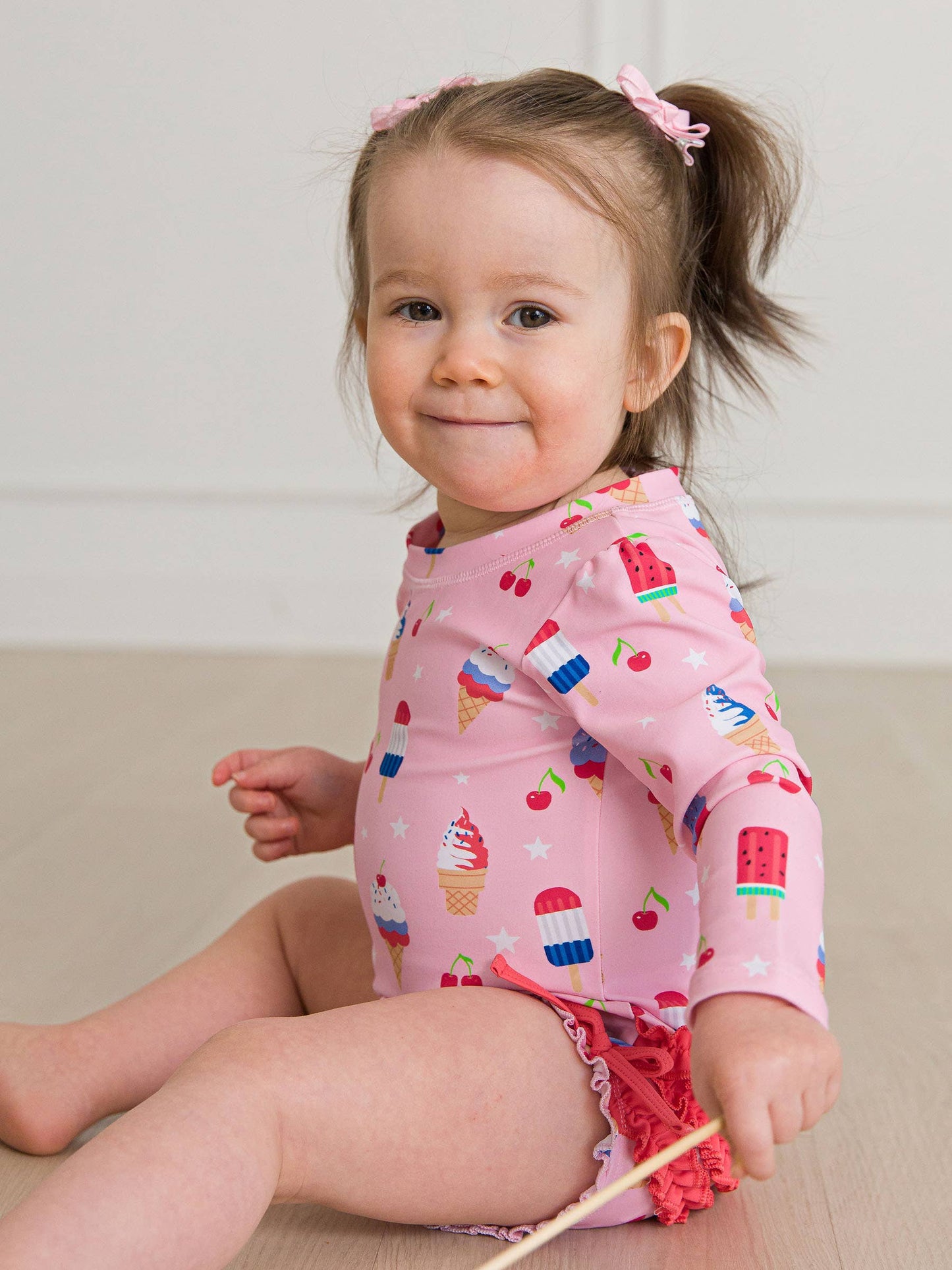 Baby Girls Sweet Freedom Long Sleeve One Piece Rash Guard Swimsuit with Signature Rear Ruffles