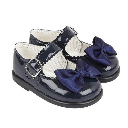 H505 Girls buckle first walker with matching satin bow